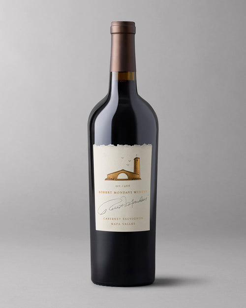 A bottle of Napa Valley Cabernet Sauvignon on a grey background
