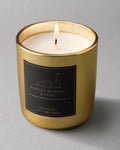 A hand poured soy candle in a Gold Vessel French Oak aroma