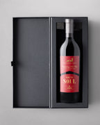 A bottle of 2021 Ode to Soul Proprietary Red Wine on a grey background.