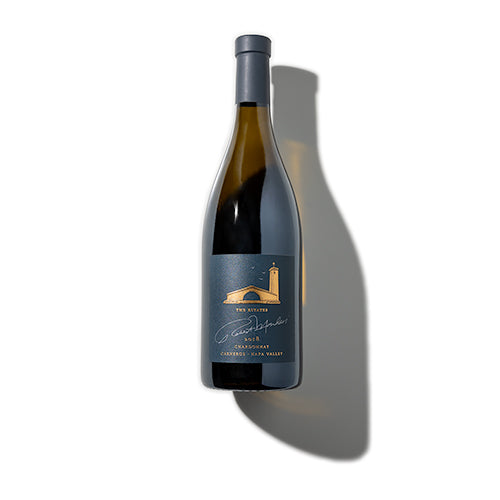 A bottle of 2018 The Estates Chardonnay Carneros Napa Valley on a white background.